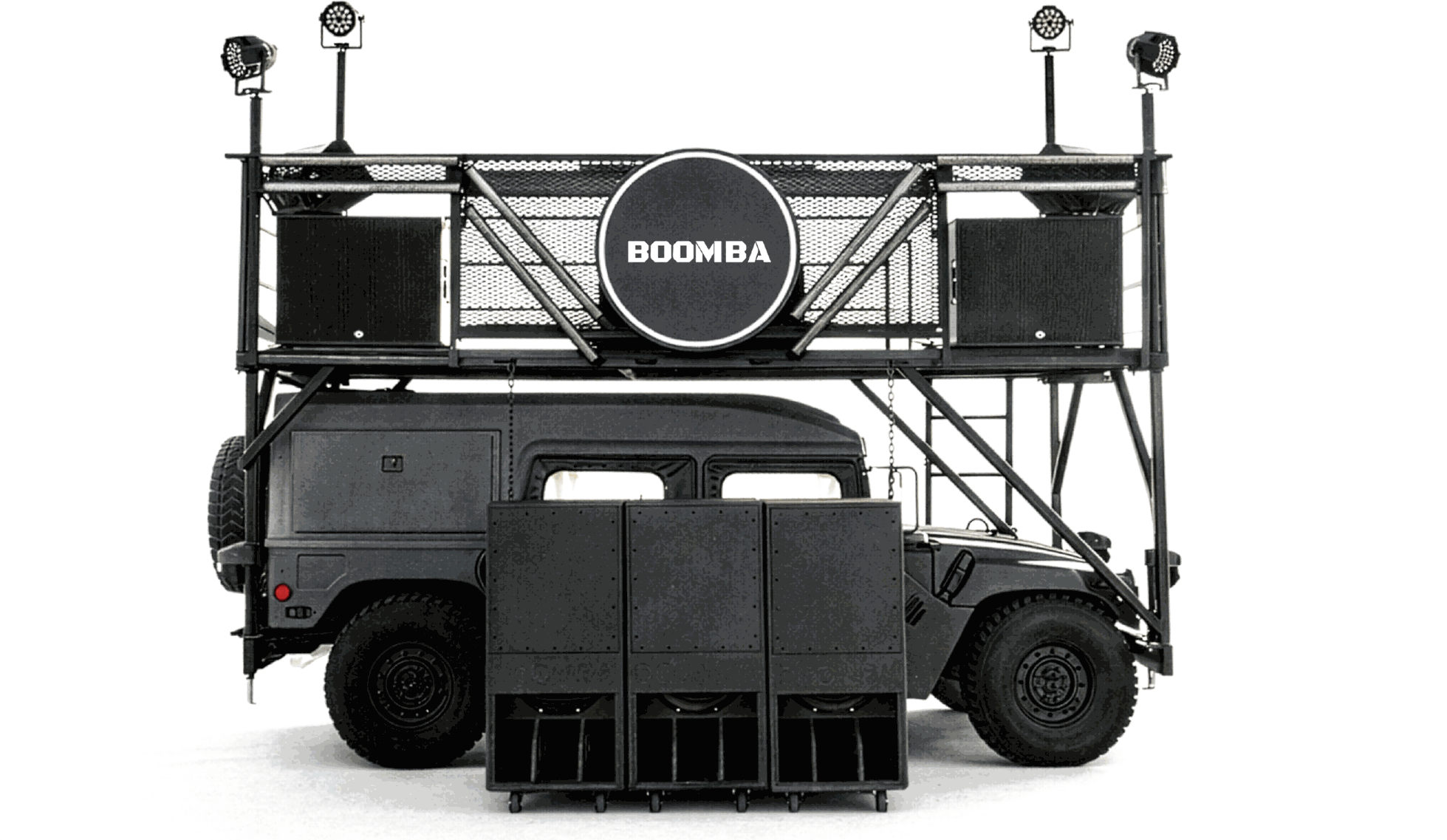 The BOOMBA soundcar — matte black Humvee with elevated stage, speakers, and lighting rig